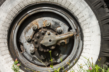 Old and rusty wheel of an old Soviet truck