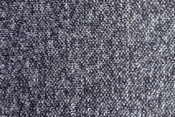 View of dark blue melange woolen fabric from above