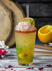 orange mojito with orange and mint leaves, garnished with orange slice