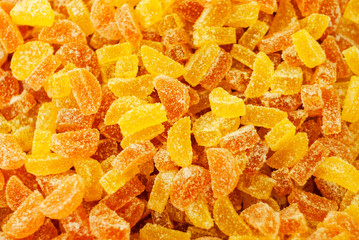 background - golden yellow translucent gumdrops in sugar