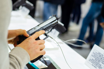 Gun Display Stands. Pistols for sale in the store.