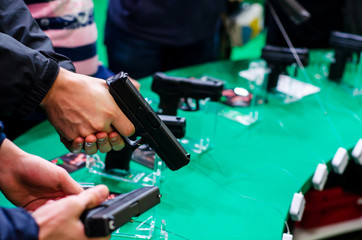 Gun Display Stands. Pistols for sale in the store.