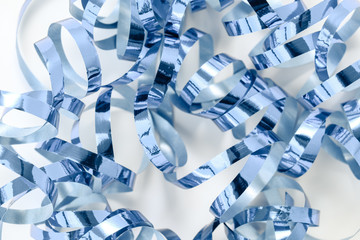 Background with sparkling blue confetti. Festive concept.