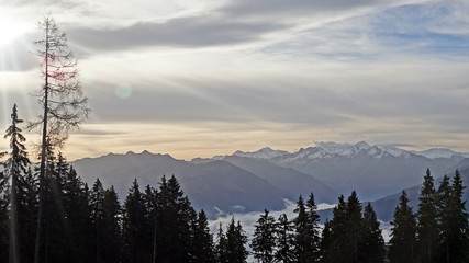 autumn in the mountain with fog in the valley