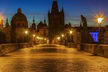 Fototapeta na wymiar Charles bridge in Prague with a palace