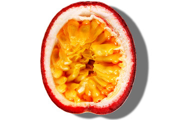 Passion fruit half with shadow isolated white background. Top view.