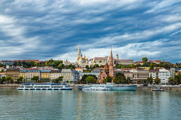 Church of St. Matthias Mátyás-templom ,Fisherman's Bastion,Calvinist Church and big pleasure ships - shore view's of the Danube, Budapest, Hungary