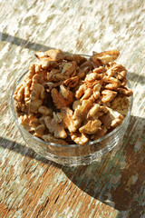 organic walnuts on wooden background