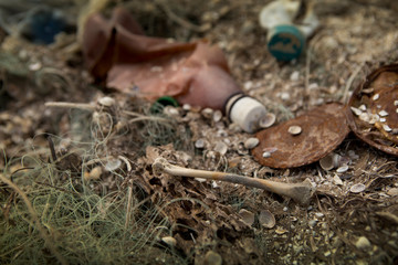 Lots of garbage and wastes in fishing net on beach