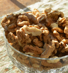 organic walnuts on wooden background