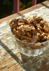 organic walnuts on wooden background