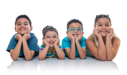 Obraz premium Happy Kids Laying on the Floor Posing for Photo