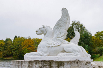 Russia, village Marfino, 29 September 2019: griffin statue at historic Gothic Old Moscow Noble count manor Marfino