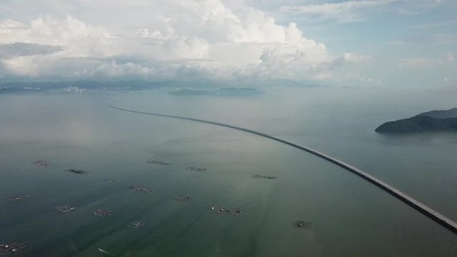 Aerial panning fish farm to Sultan Abdul Halim Muadzam Shah Bridge and Pulau Aman.