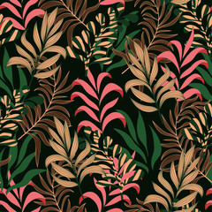 Fashionable seamless tropical pattern with hot pink and beige plants and leaves on black background. Jungle leaf seamless vector floral pattern. Beautiful exotic plants.  Trendy summer Hawaii print.