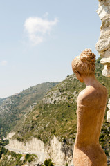Statue Looking Over Hills