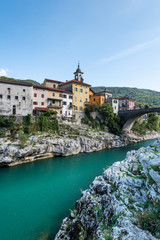 Fototapeta na wymiar Colorful Town Kanal Ob Soci in Slovenia. Small Village at The Soca River