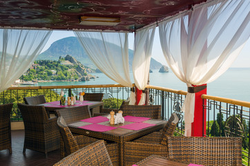 interior of empty cafe over the sea