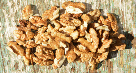 organic walnuts on wooden background