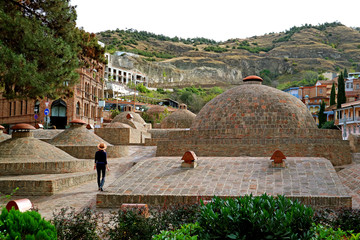 Woman Exploring the Famous Medieval Sulfur Baths in the Old Tbilisi of Georgia Country