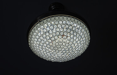 custom light fixture with crystals shines bright