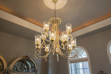 chandelier with bright lights hangs in your dining room