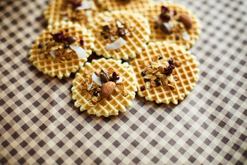 Traditional belgian waffles with nuts mix, oatmeal and almonds. Haealthy food. Flat lay, top view, copy space