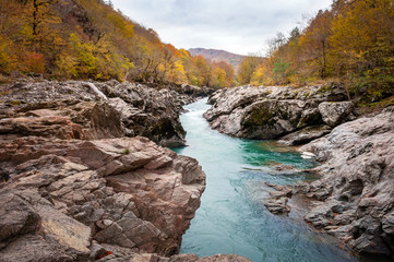 Mountain river flowing through the rocks
