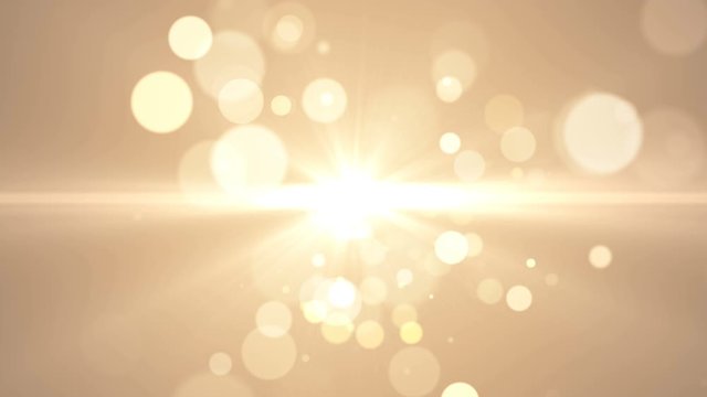4k. Bokeh lights. Christmas light. Glitter texture. Motion graphics. Sparkle background. Floating particles. Center point flare. Gold color.