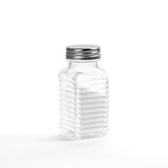 Glass salt shaker. Close up. Isolated on white background