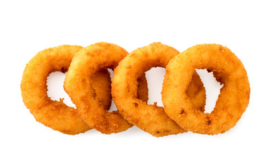 Onion rings lie flat on a white background. The view of the top.