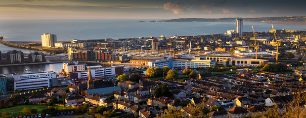 A view of Swansea city centre and the Bay area from the docks to Mumbles in South Wales, UK