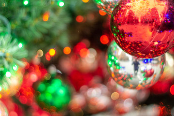 Christmas ornaments on the Christmas tree with bokeh background