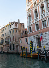 Old buildings in Venice. Canal view with boat. Travel photo. Italy. Europe.