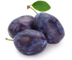 Fresh plums on white background