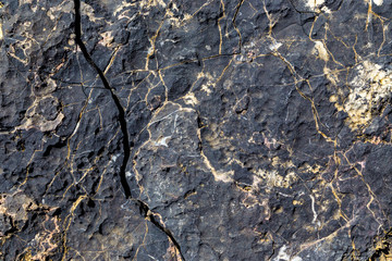 Texture of rock with quartz lines