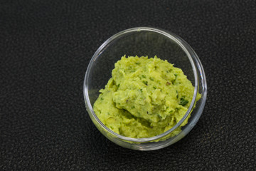 Avocado guacamole sauce with chili pepper