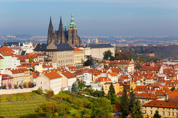 Autumn Prague City with gothic Castle and colorful Nature and Trees from the Hill Petrin, Czech Republic