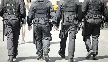 cops with antiriot uniform - obrazy, fototapety, plakaty