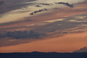 sunsets with stunning colors and delicate clouds