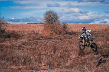 Motocross rider in action. Motocross sport. Close-up photo. Active extreme rest.