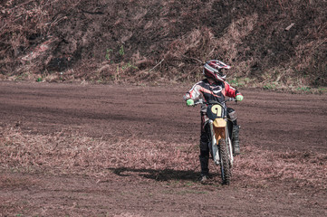 Motocross rider in action. Motocross sport. Close-up photo. Active extreme rest.
