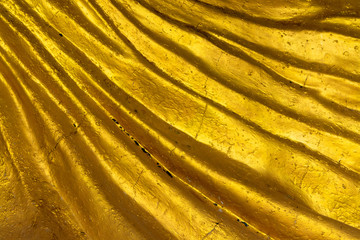 Abstract pattern of gold background,wave surface of golden stone.
