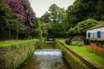 Images for beautiful village landscape in San Miguel, Azores, Portugal. Traditional old house in Azores. Idyllic stone village with stone houses. Garden. Nature.