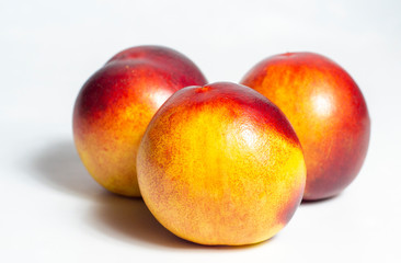 fresh peaches isolated on white background.