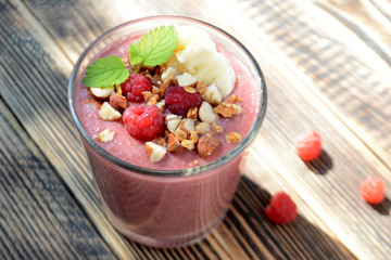 Fresh raspberries and bananas   smoothies  Healthy food concept