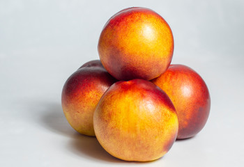 fresh peaches isolated on white background.