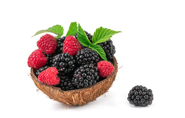 raspberries and blackberries on a white background