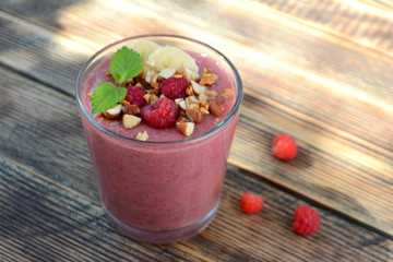 Fresh raspberries and bananas smoothies Healthy food concept