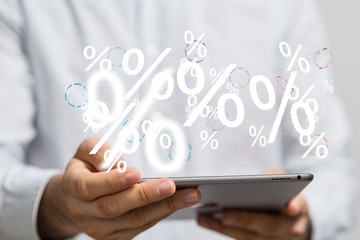 hand touches virtual percent icon